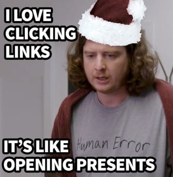 Guy wearing santa hat loves clicking links because it's like opening presents
